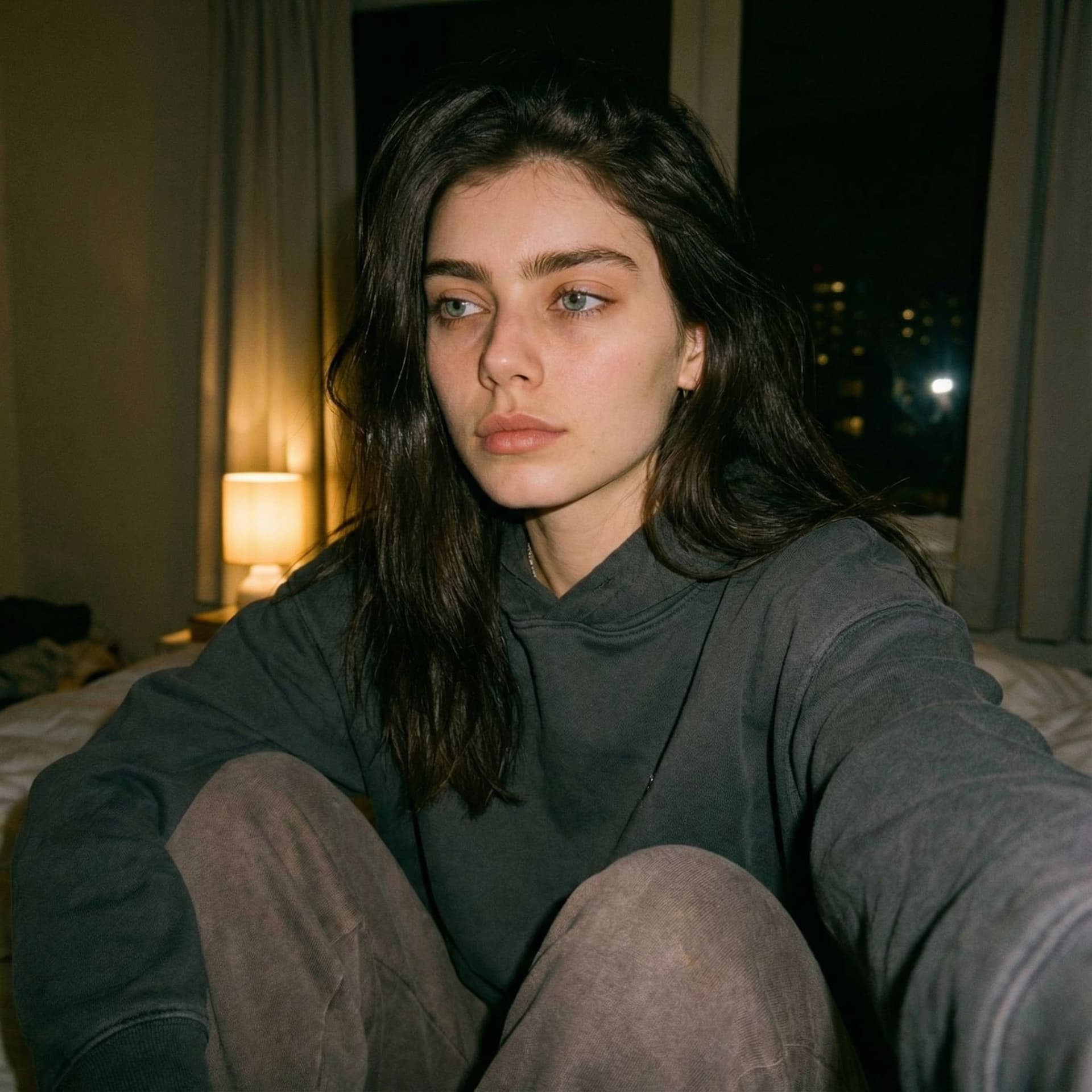 AI generated: Ultra-realistic selfie of a young woman named Yara in her bedroom at night, taken on a phone camera....
