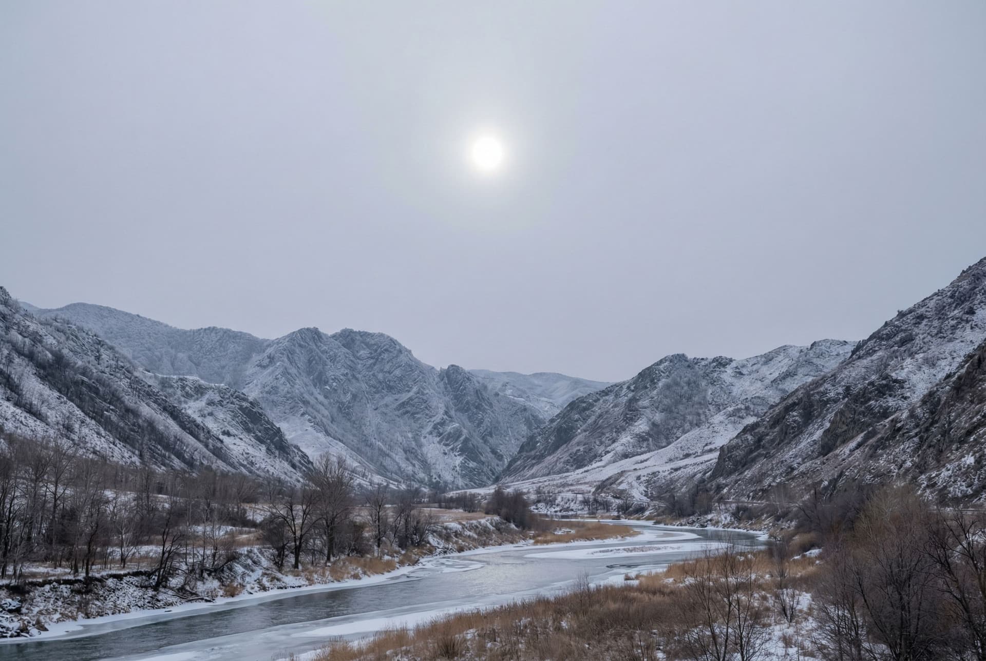 AI generated: a scenic landscape with valleys and rivers but the sky has a more grey color  with no clouds and the...