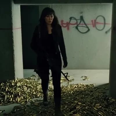 AI generated video: Escape . (Woman follows trail of empty bullet cases:1.9), she is inside anunderground bunker, listen...