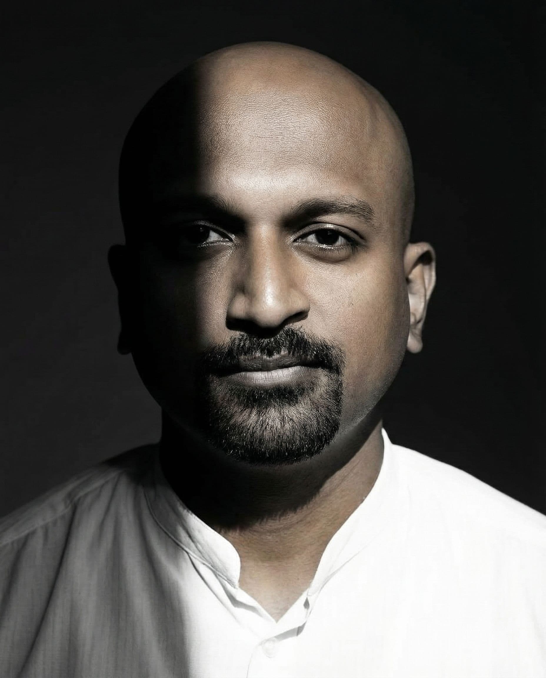 AI generated: a black and white photo of a man with shadow., in the style of minimalist beauty, light bronze and b...