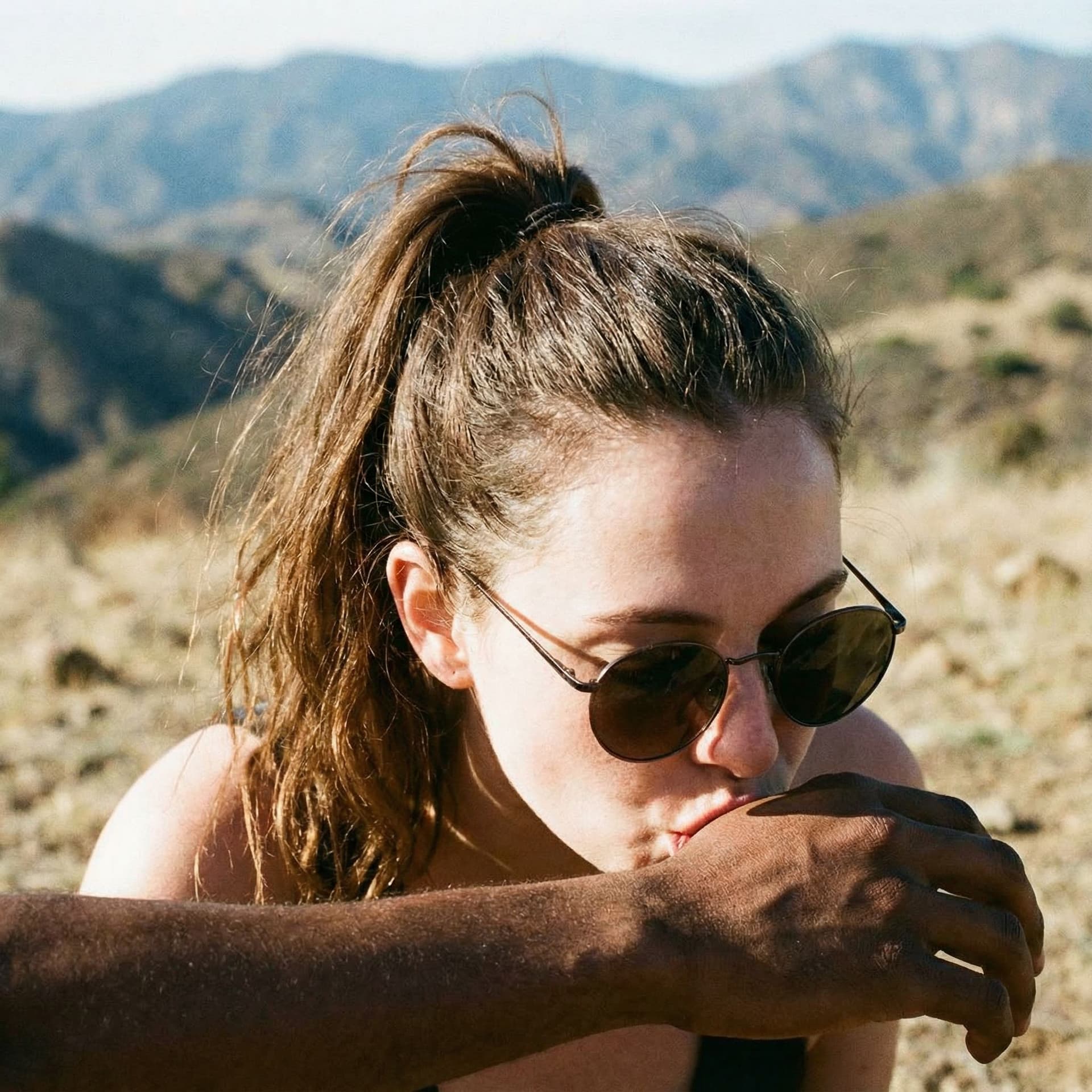 AI generated: NSFW. This photograph captures a close-up of a young woman with fair skin and brown hair in a messy ...