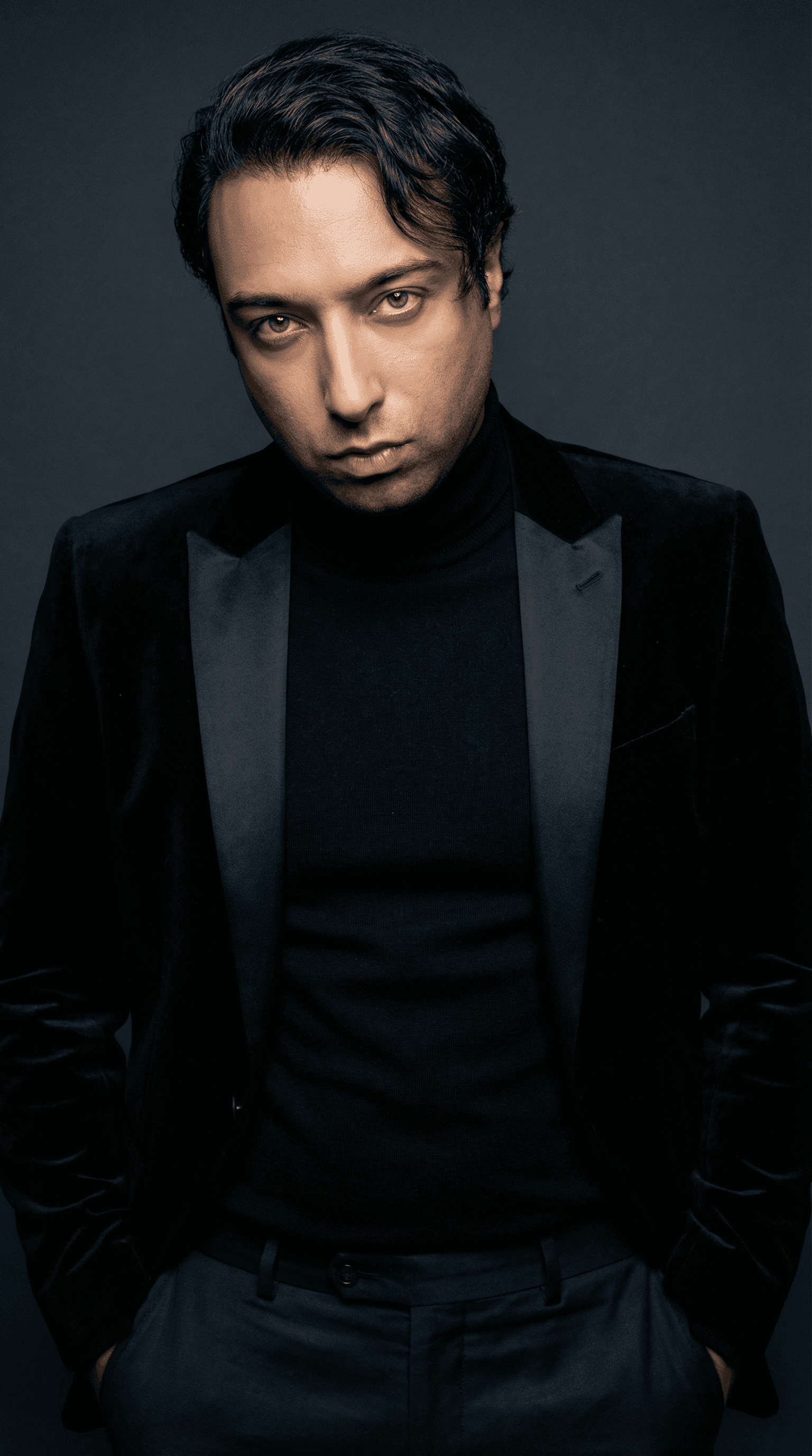 AI generated: # Goal
Generate a high-resolution studio portrait photograph that captures a sophisticated, moody fa...