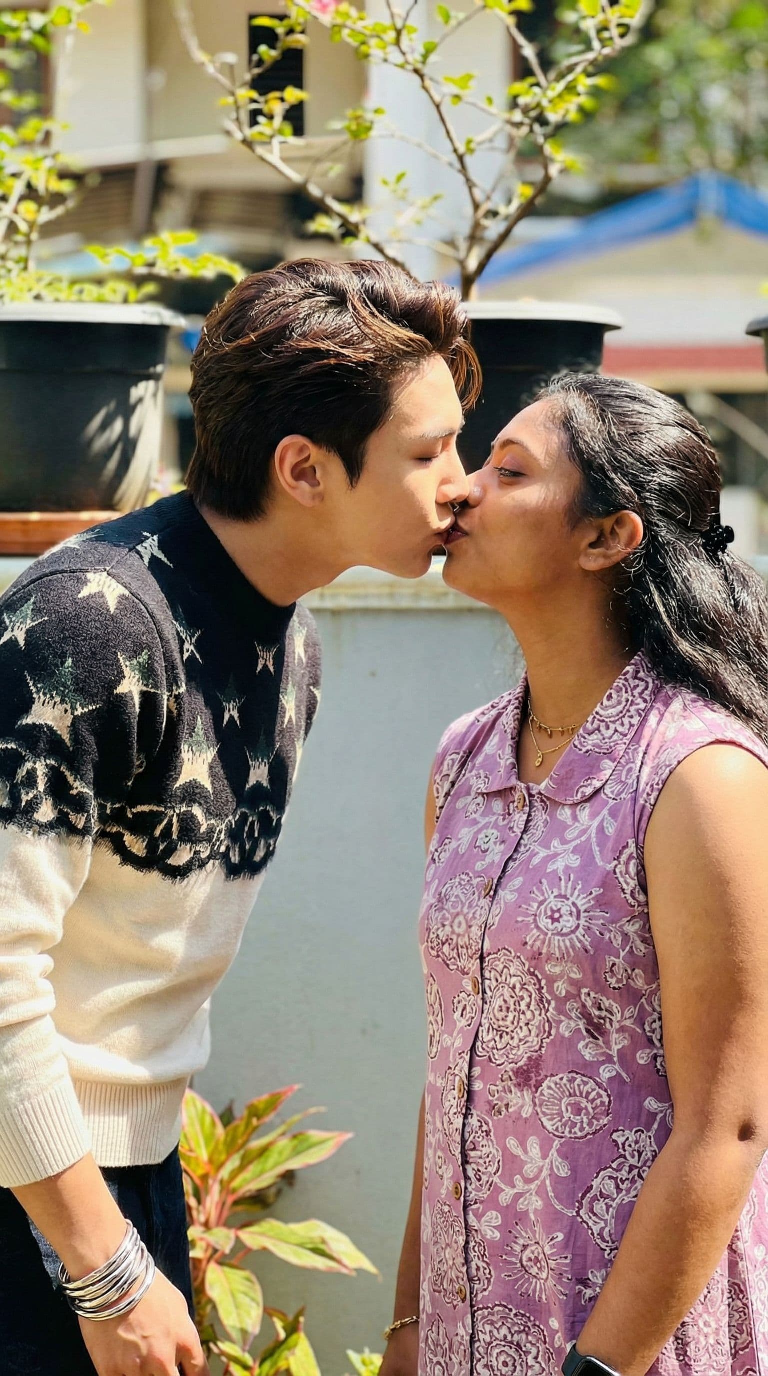 AI generated: Create A image both of them kissing