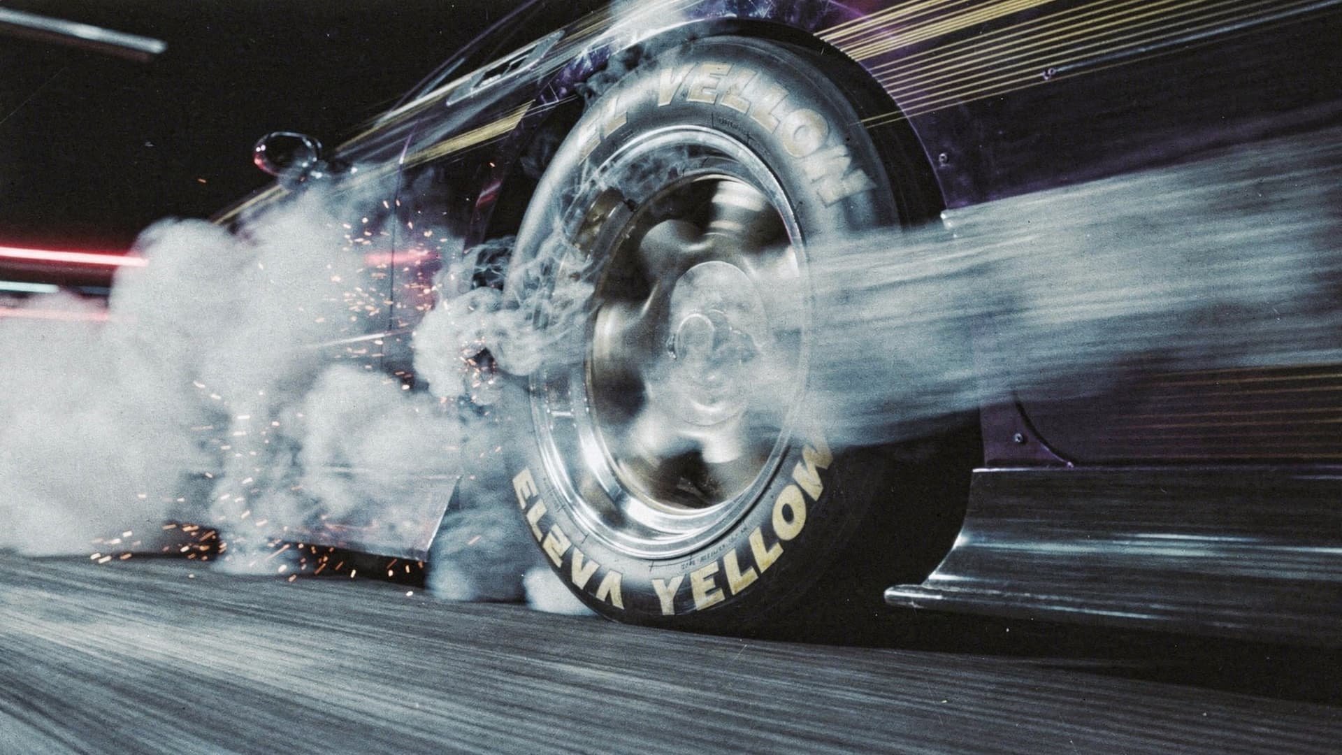 AI generated: cinematic close-up of a high performance racing tire spinning at extreme speed, dramatic burnout, th...