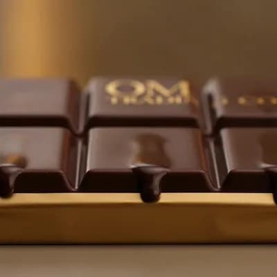 AI generated video: create an ultra realistic ai video for my product that is a chocolate create the video for brand pro...