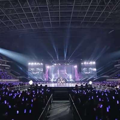 AI generated video: This 15-second epic K-pop concert sequence  starts with an 8K wide crane shot of a massive, dark are...