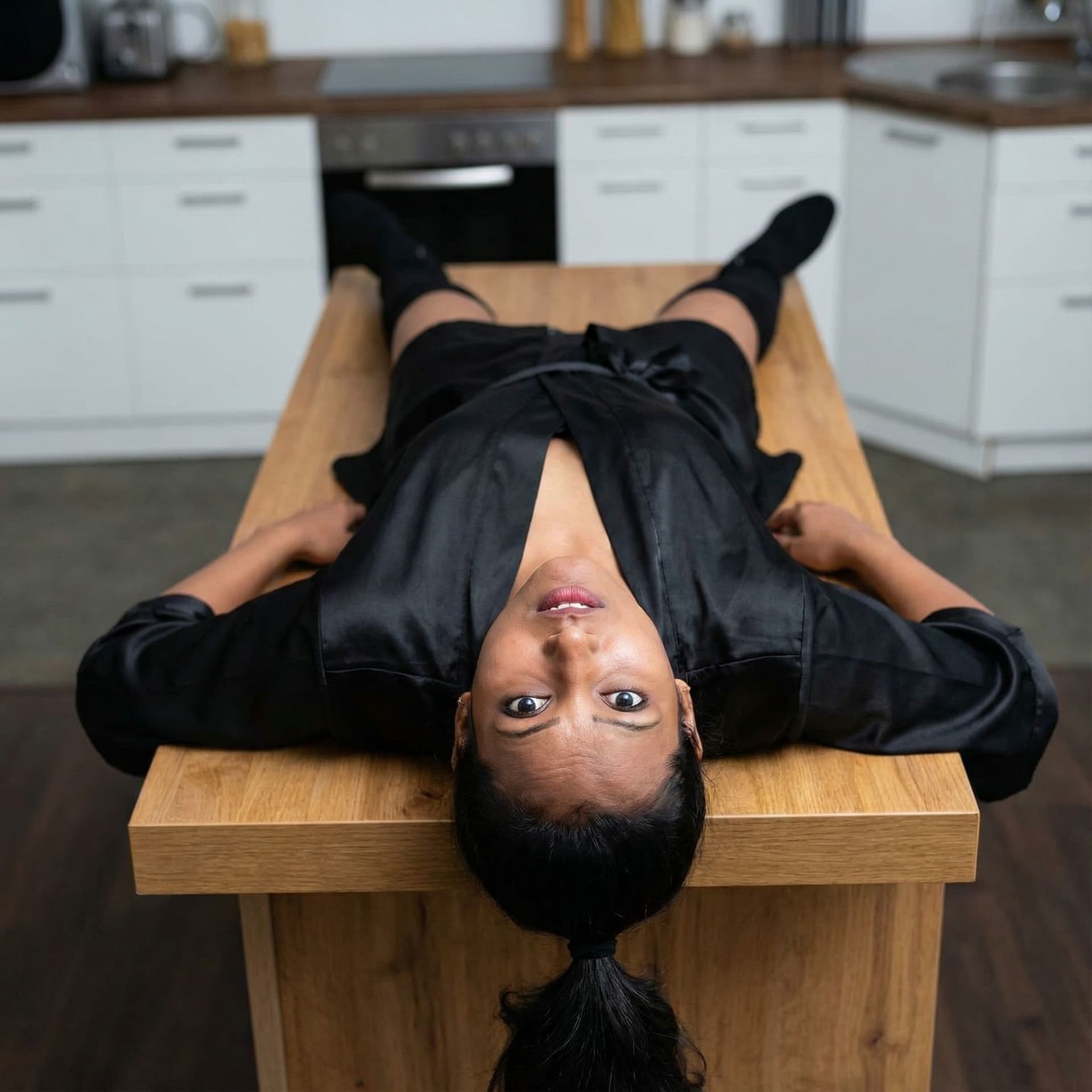 AI generated:  girl in Kitchen,lying on table,with spread legs,long black hair,ponytail,gorgeous,stunning,pretty f...