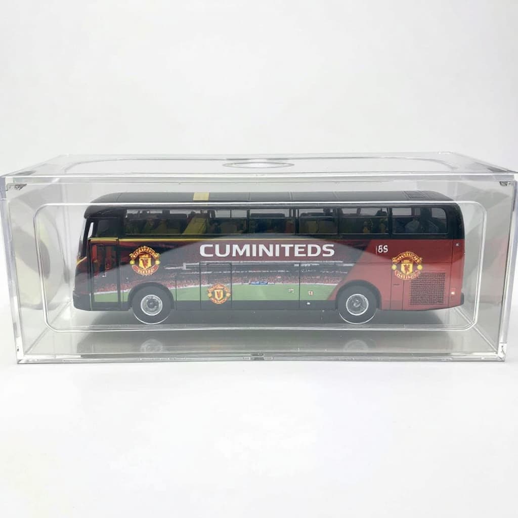 AI generated: Bus painted with Manchester United Football Club placed in a plastic case.