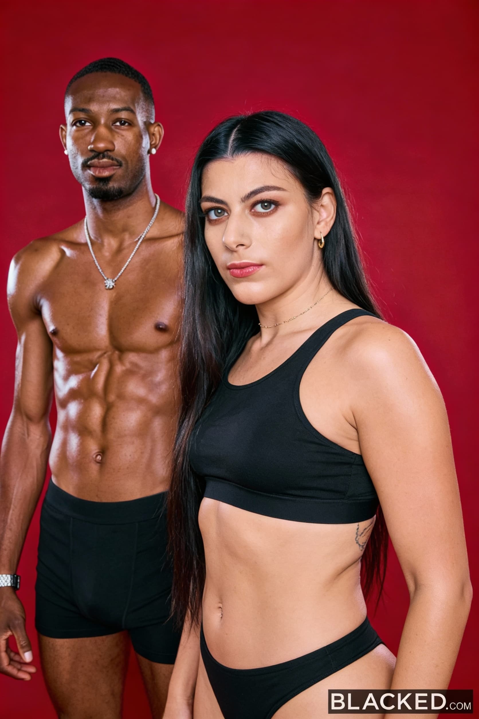 AI generated: The image shows two adults posing together in a studio setting against a solid red background. The w...