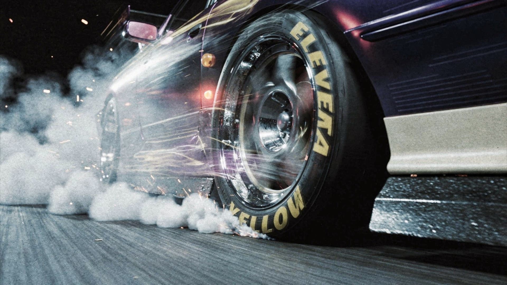 AI generated: cinematic close-up of a high performance racing tire spinning at extreme speed, dramatic burnout, th...