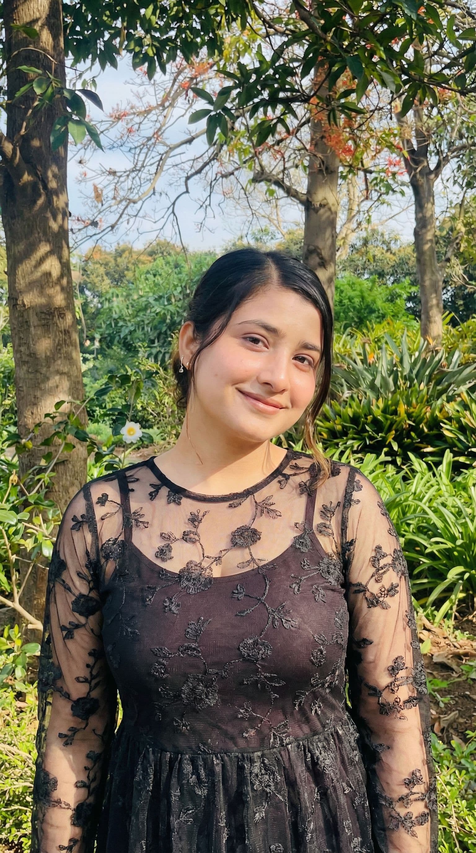 AI generated: Truly beautiful confident woman wearing a sheer dress outdoors