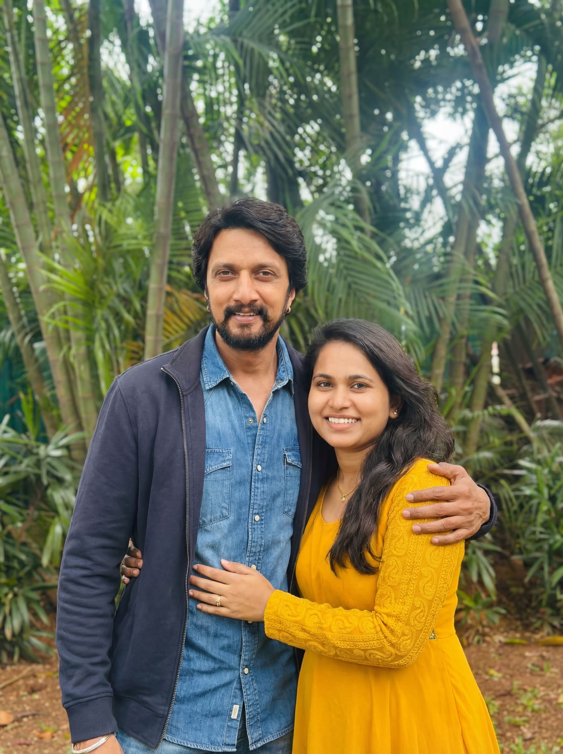 AI generated: Create side hugging kichha sudeep 