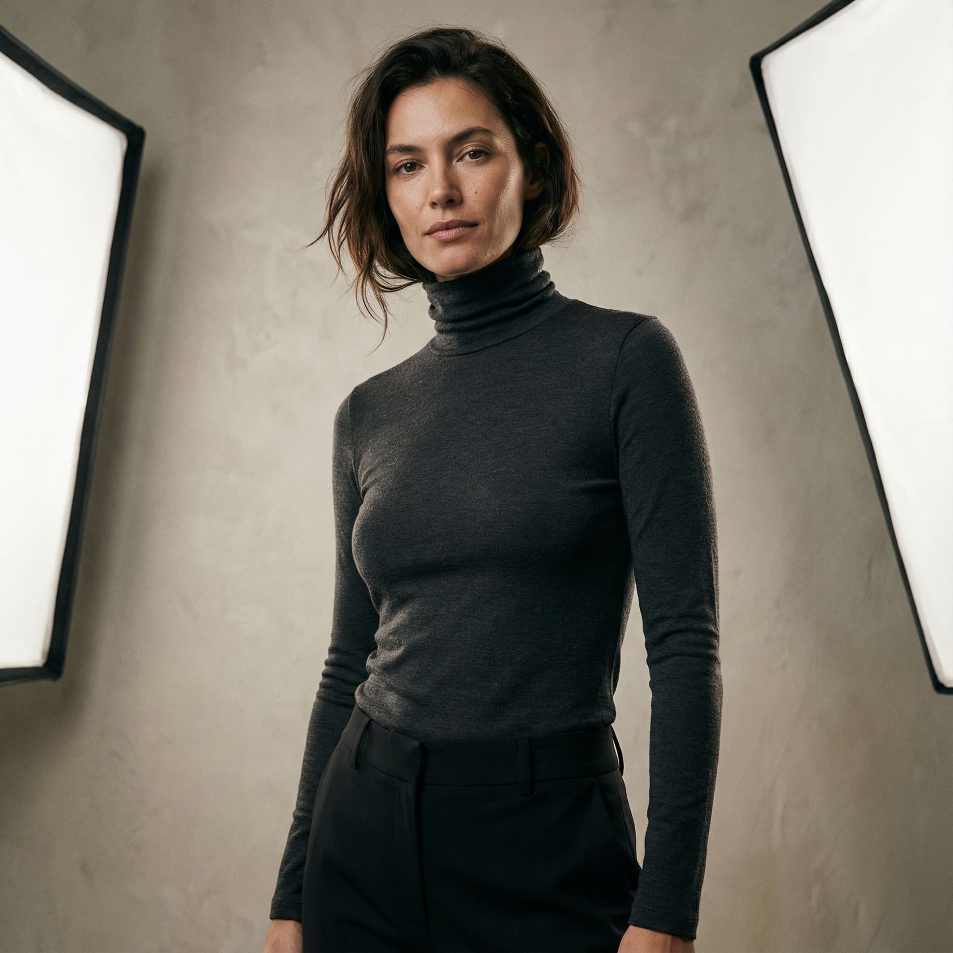 AI generated: Ultra-realistic fashion campaign photograph of a confident modern woman posing for a luxury brand ph...