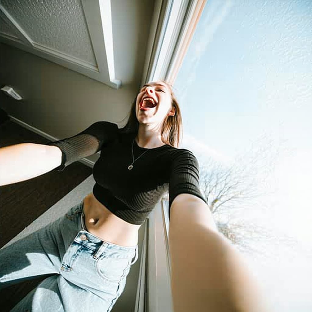 AI generated: Lo-fi snapshot, early-2010s iPhone selfie taken from a high overhead angle.
A young woman kneels lo...