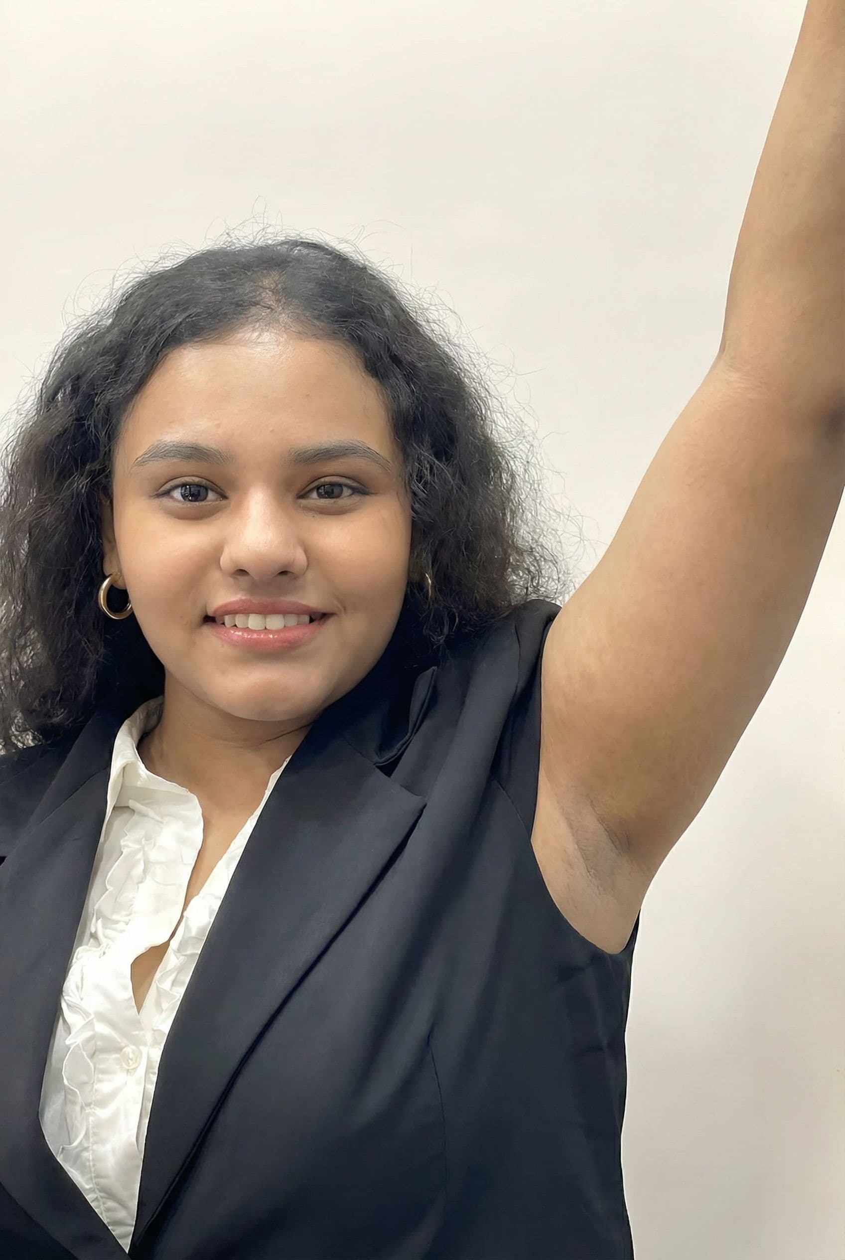 AI generated: She shows her armpit closeup and her face shown