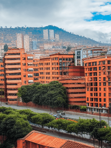 AI generated: city ​​with apartment building towers with brick facades and high vehicular traffic in bogota colomb...