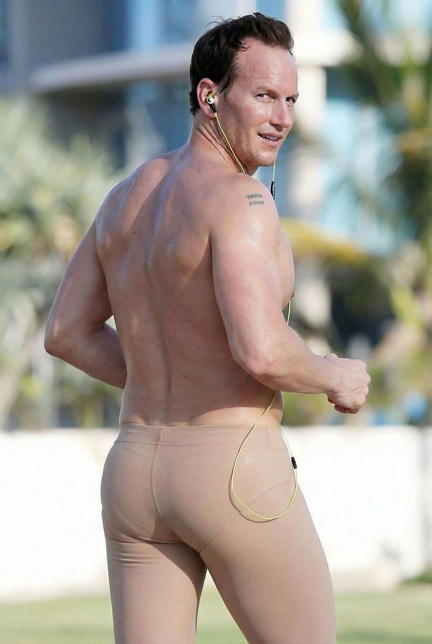 AI generated: Big ass in latex speedo nude color