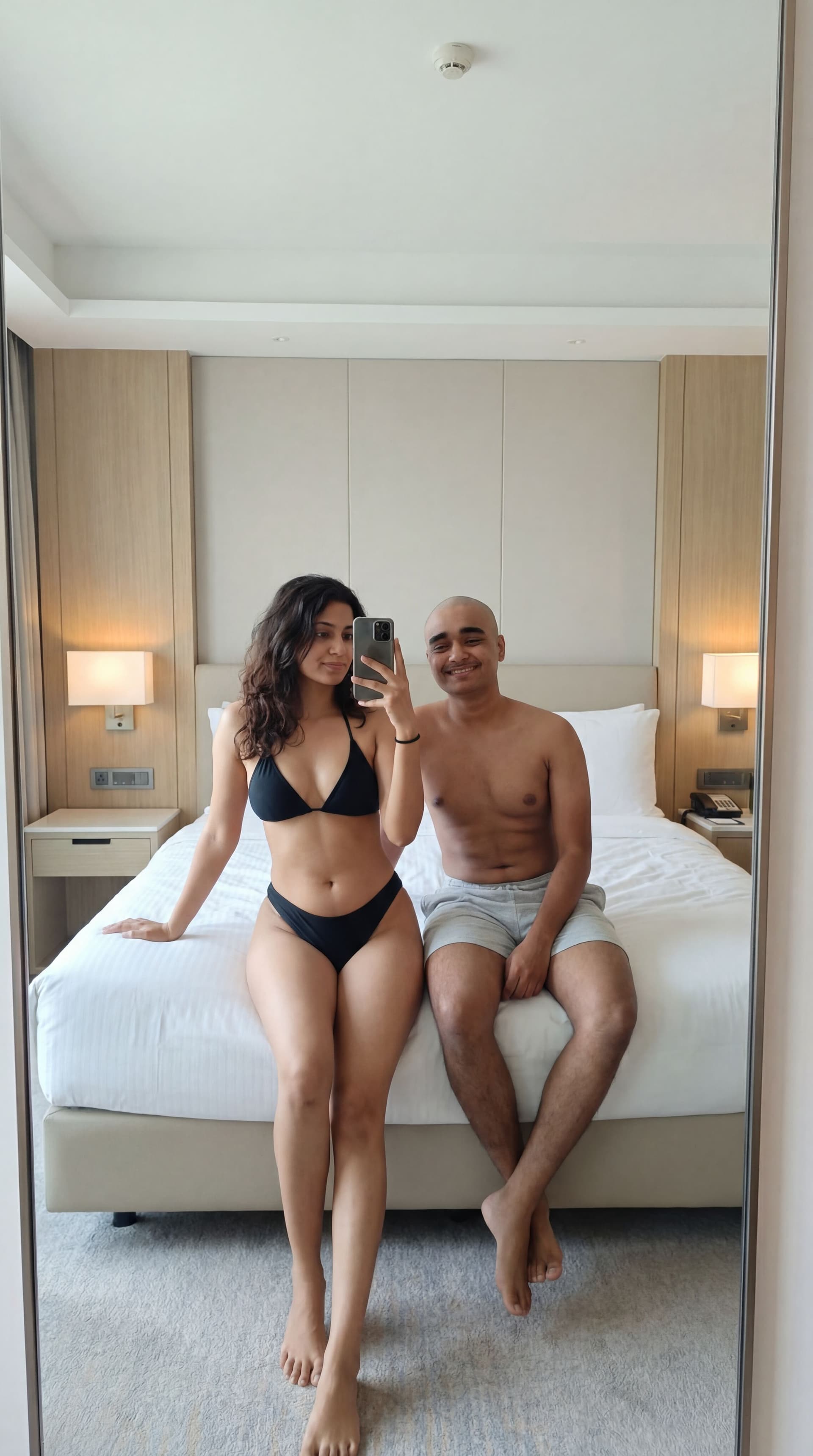 AI generated: {
  "scene": {
    "setting": "Modern hotel room",
    "background_details": {
      "furniture": "L...
