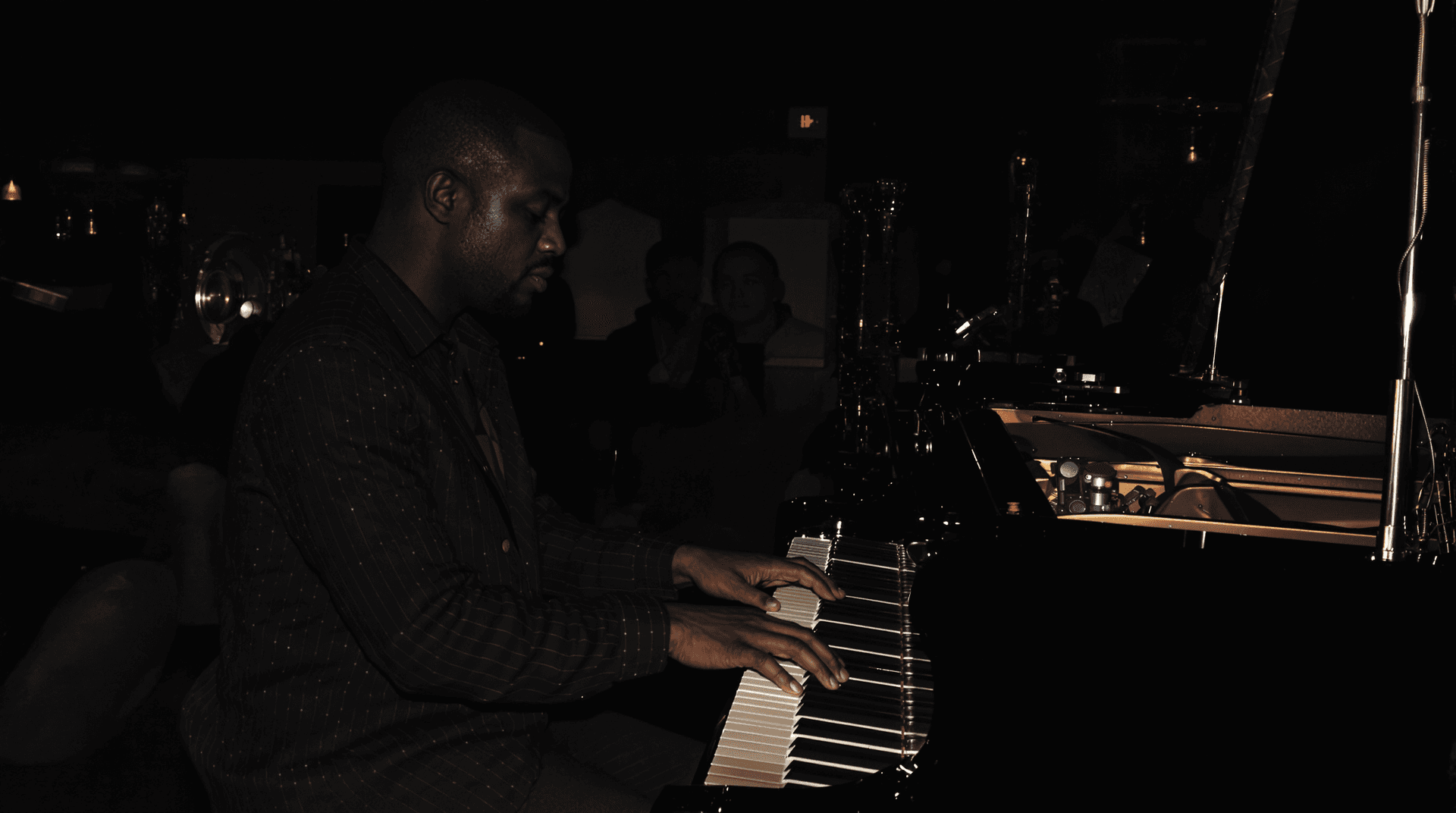 AI generated: In a dim jazz club, a pianist channels the genre's legends through masterful performance. Echoes of ...