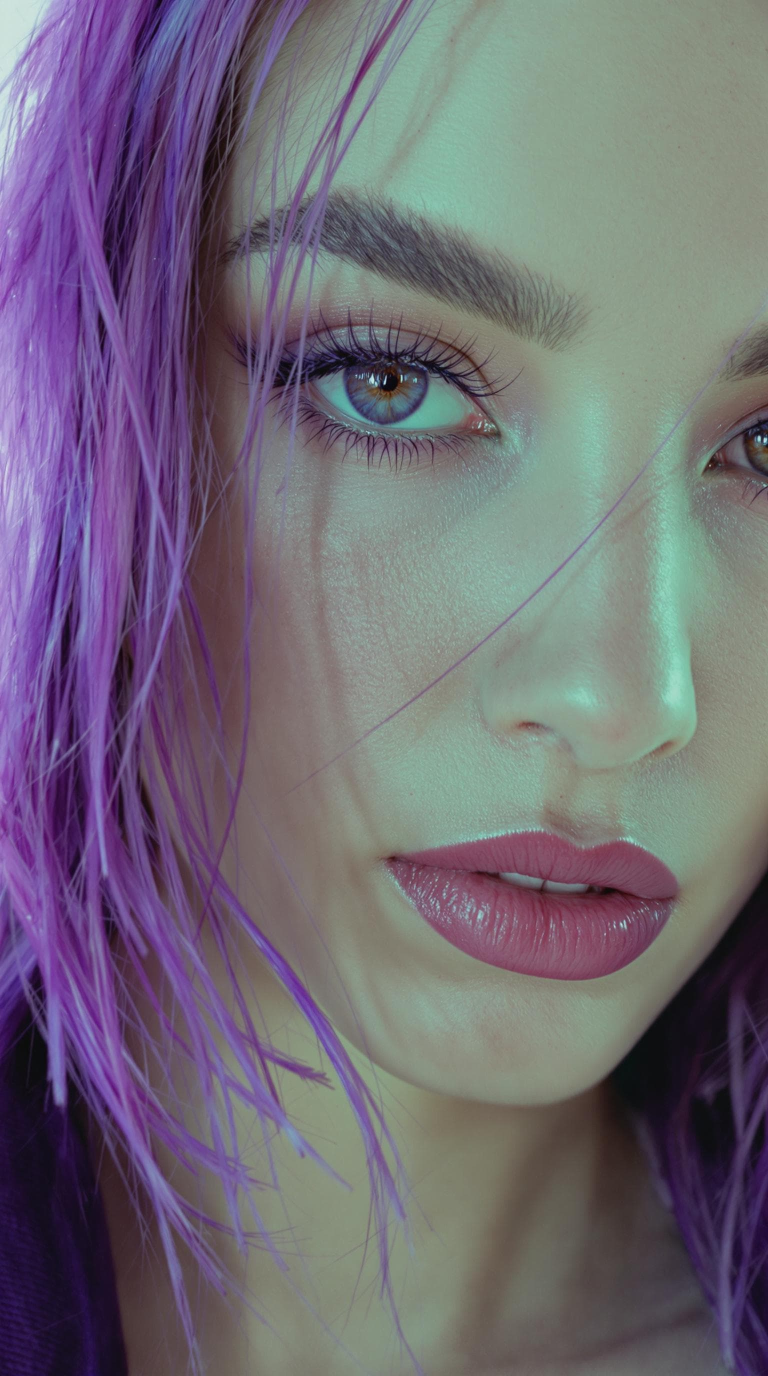 AI generated: A close-up portrait of a woman with vibrant purple hair, captured in ultra-realistic 8K resolution u...