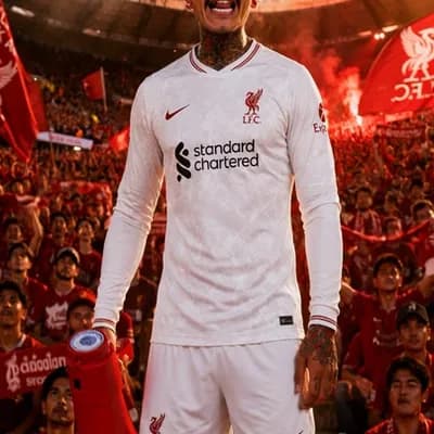AI generated video: Use the reference image as the exact character.
A Liverpool fan stands on the stadium stairs surroun...