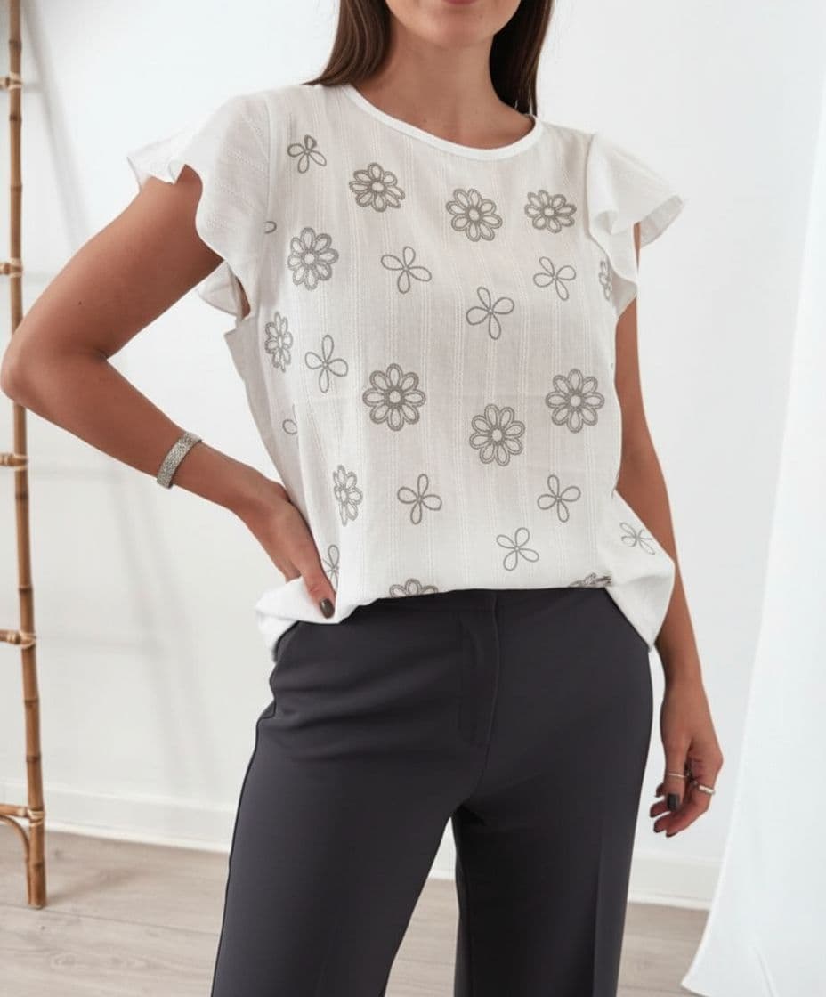 AI generated: change the pose of the same female model from the reference image to a casual professional stance. k...