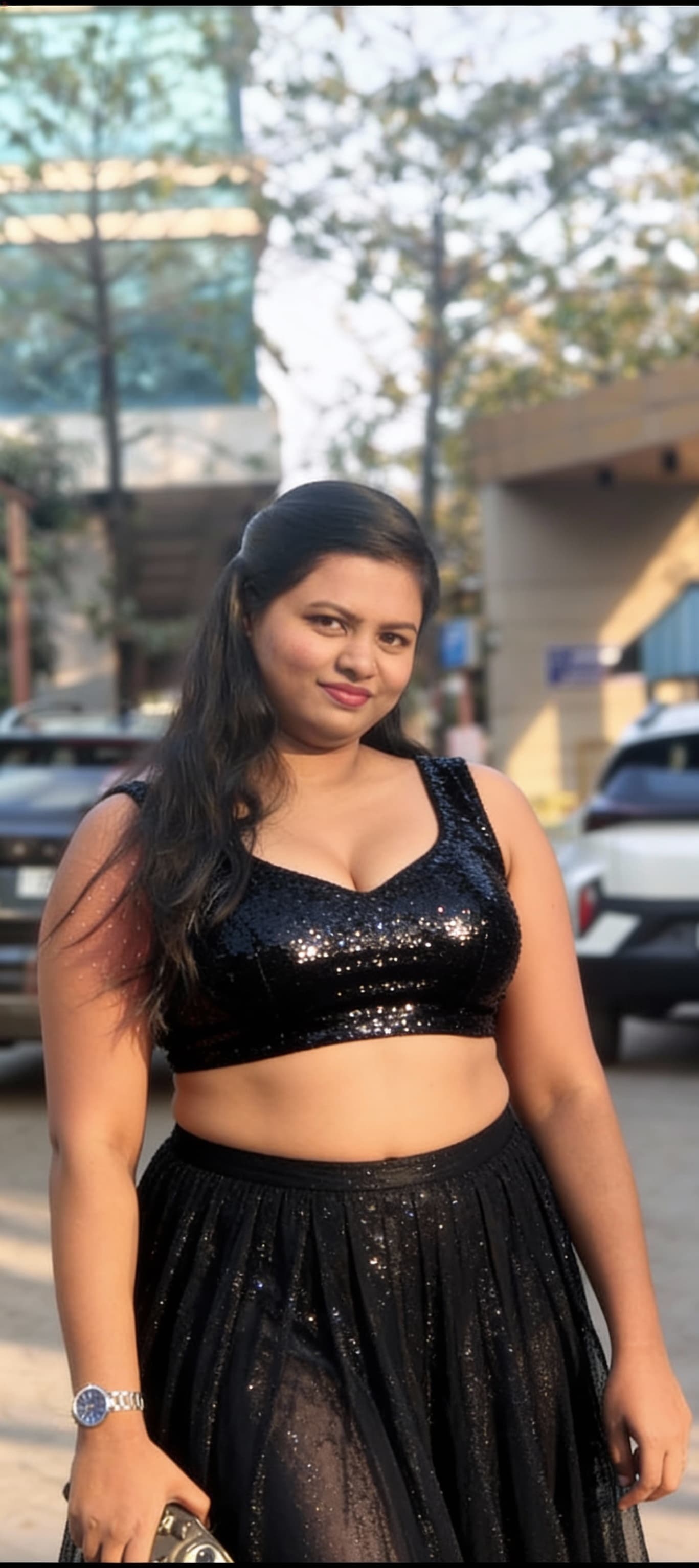 AI generated: Want to create an image  wearing a bright black tightly fitted  crop sleeveless shimmer shining sequ...