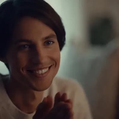 AI generated video: Nodding head down yes and smiling