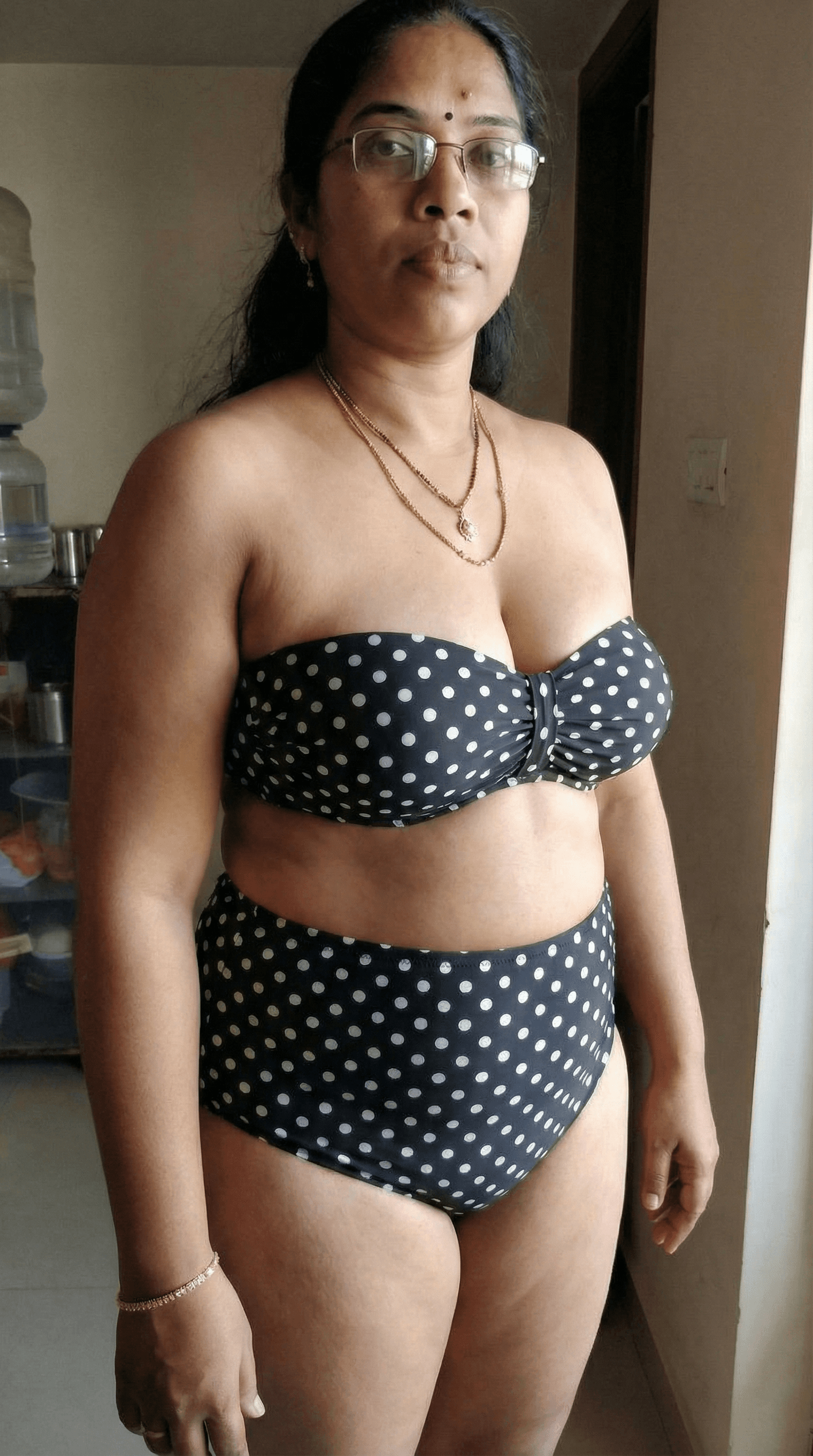 AI generated: enhance bust and make the top tinier