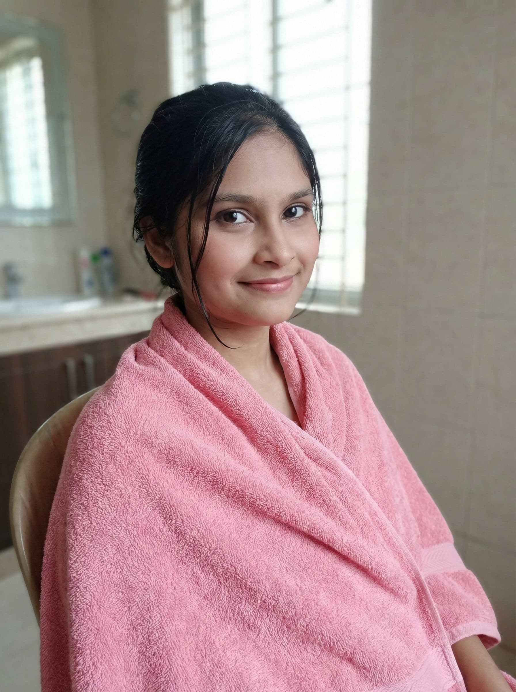 AI generated: Girl in pink towel 