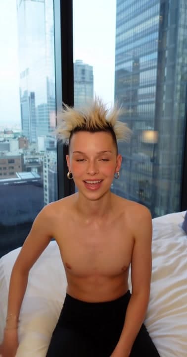 AI generated video: video of a cute 18 yo punk girl with small breasts, flat chest, waif thin body. She removes her t sh...
