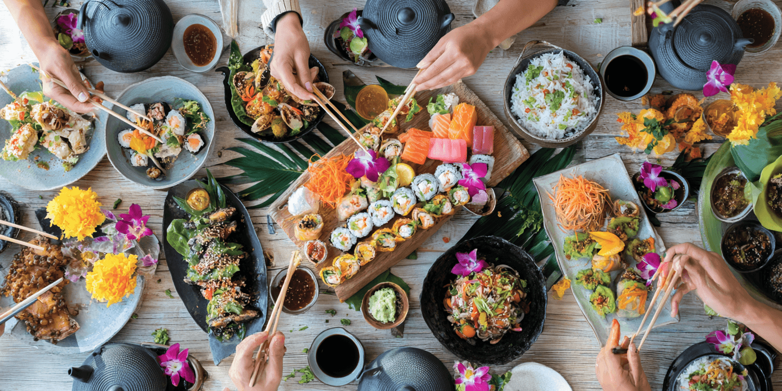 AI generated: High-angle, full shot of a dining table laden with various Asian dishes,  featuring a variety of sus...