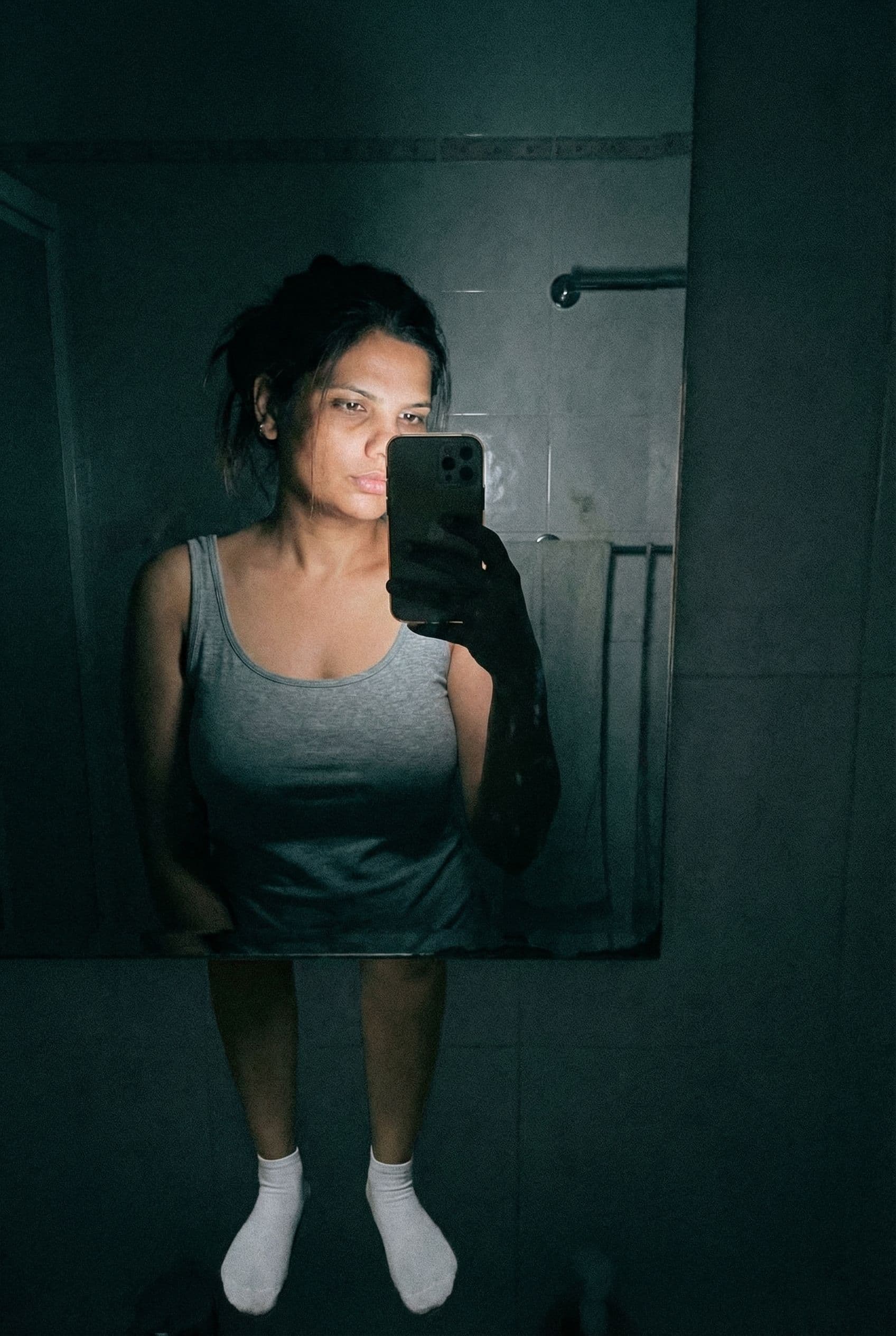 AI generated: Romantic iPhone mirror body selfie,a sloppy snapshot. on a bathroom at night (no lights, wearing a t...