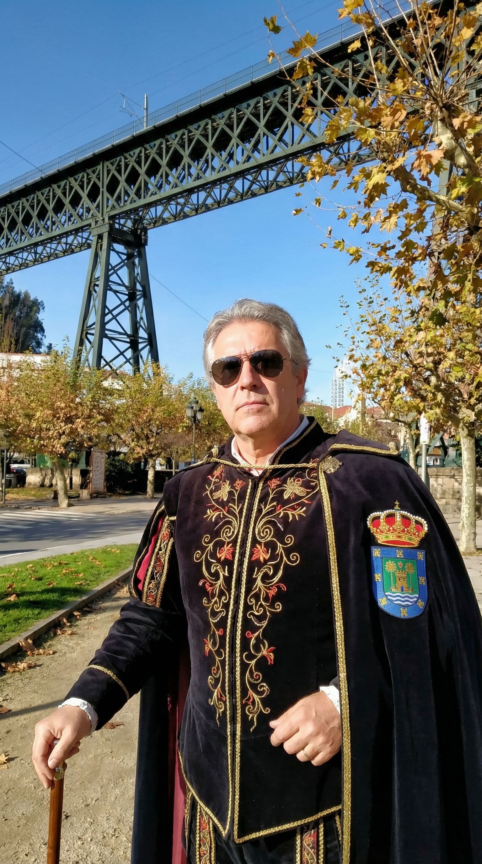 AI generated: Photorealistic image of the man in the pictures as a prince of a redondela, galicia adding in the ba...