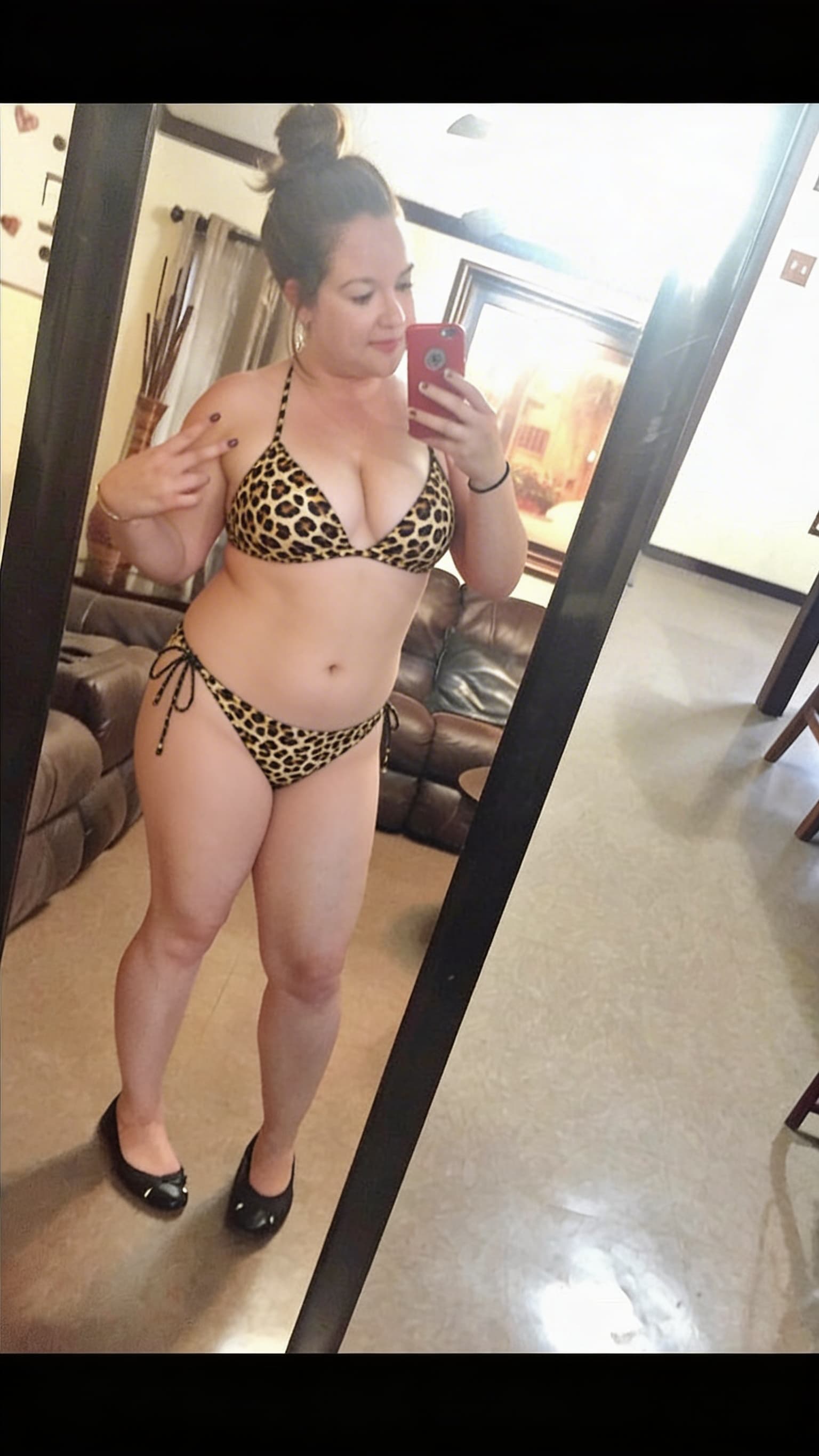 AI generated: Make subject wear a cheetah print bikini 