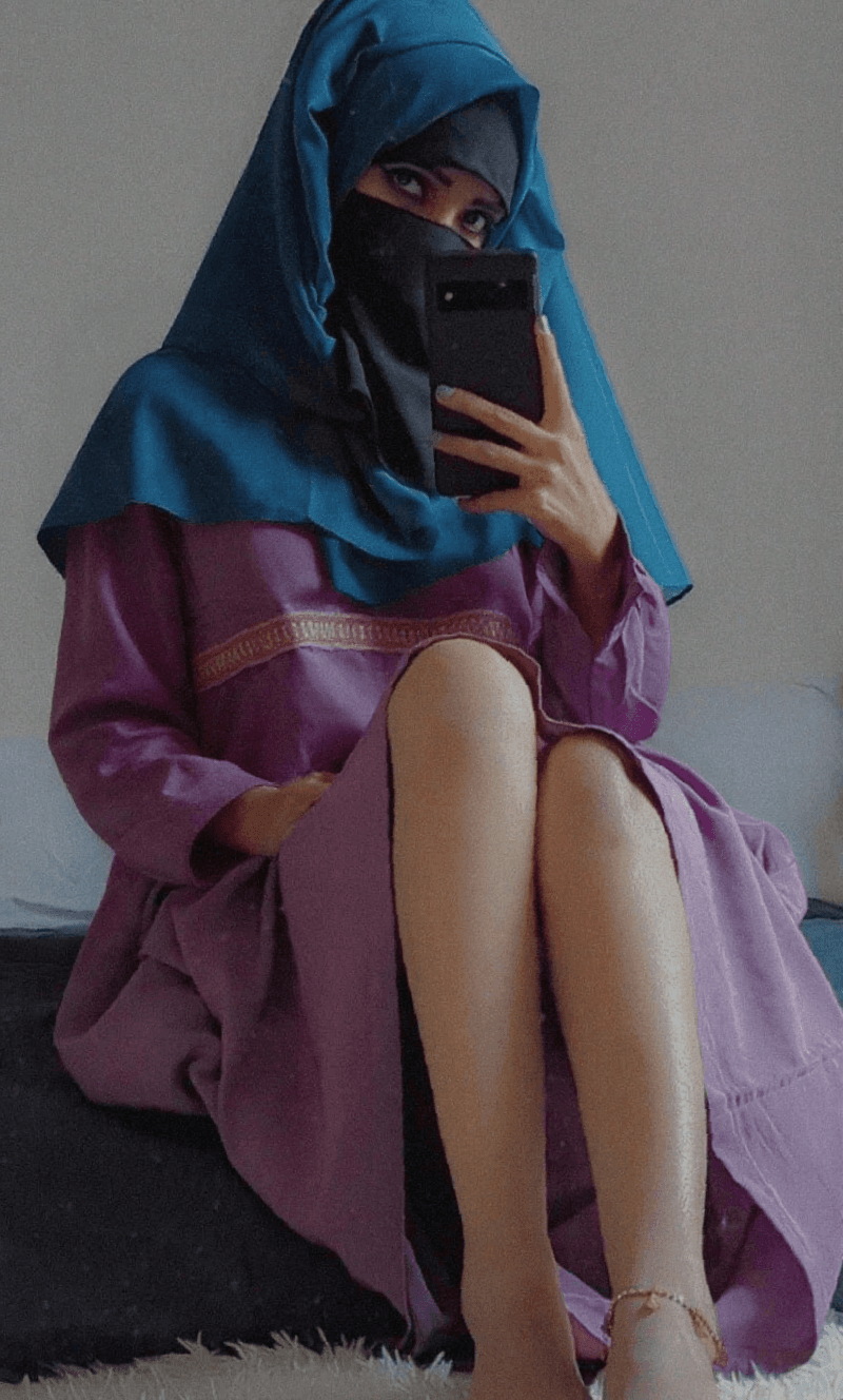 AI generated: Hijabi girl showing boobs in abaya
