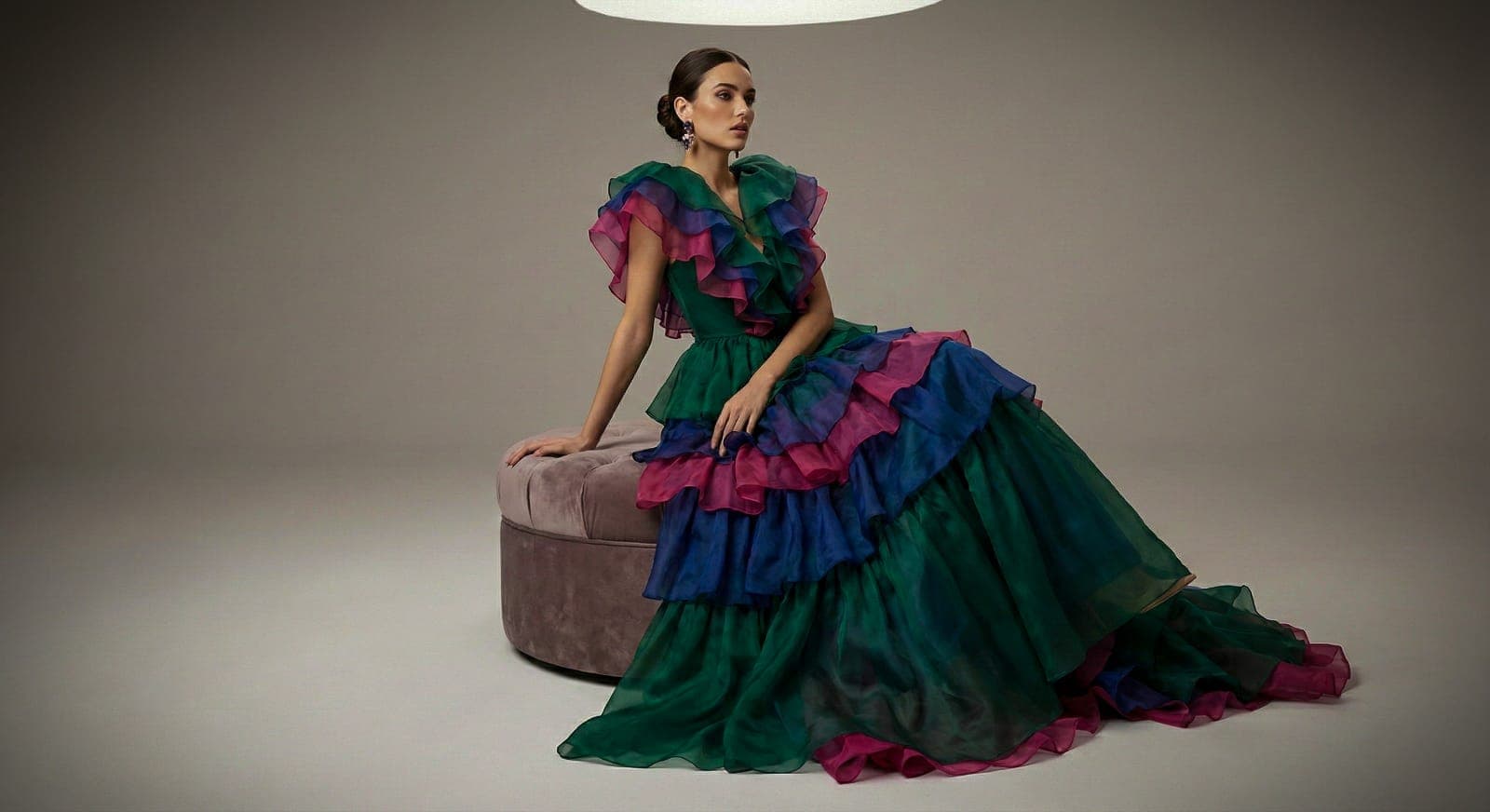AI generated: Create a fashion image of a female model wearing a dramatic layered ruffle dress in vibrant solid co...
