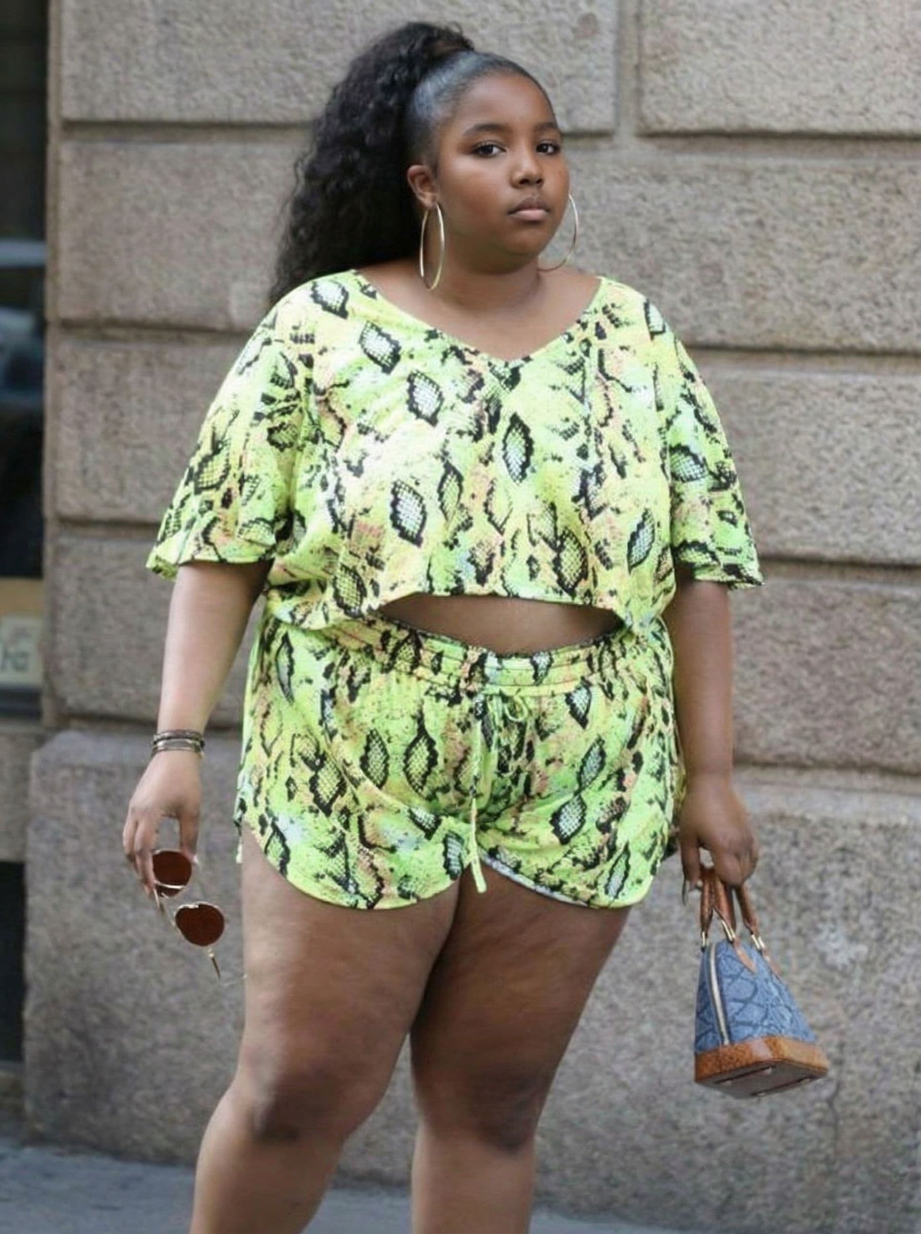 AI generated: Perform a realistic face swap between two women. Base image: - A plus-size woman with a full body fr...