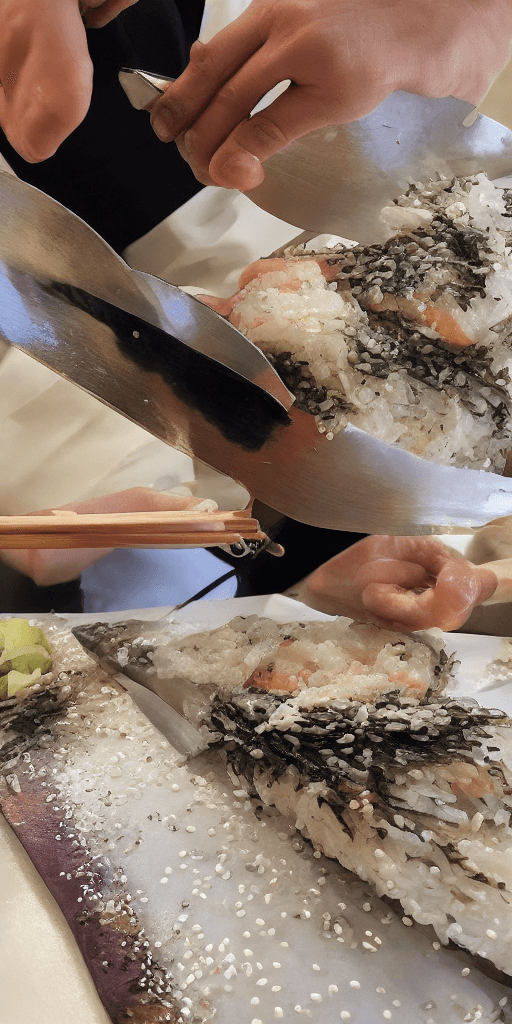 AI generated: In a traditional sushi restaurant, a skilled !sushi chef! meticulously prepares a unique and captiva...