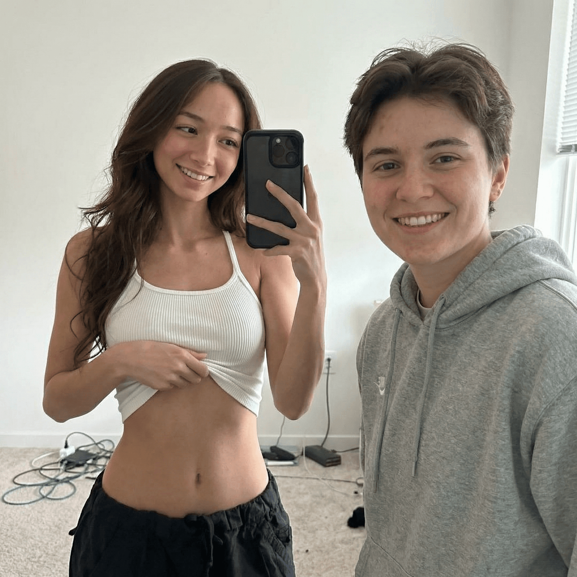 AI generated: lift her shirt up with her right hand
