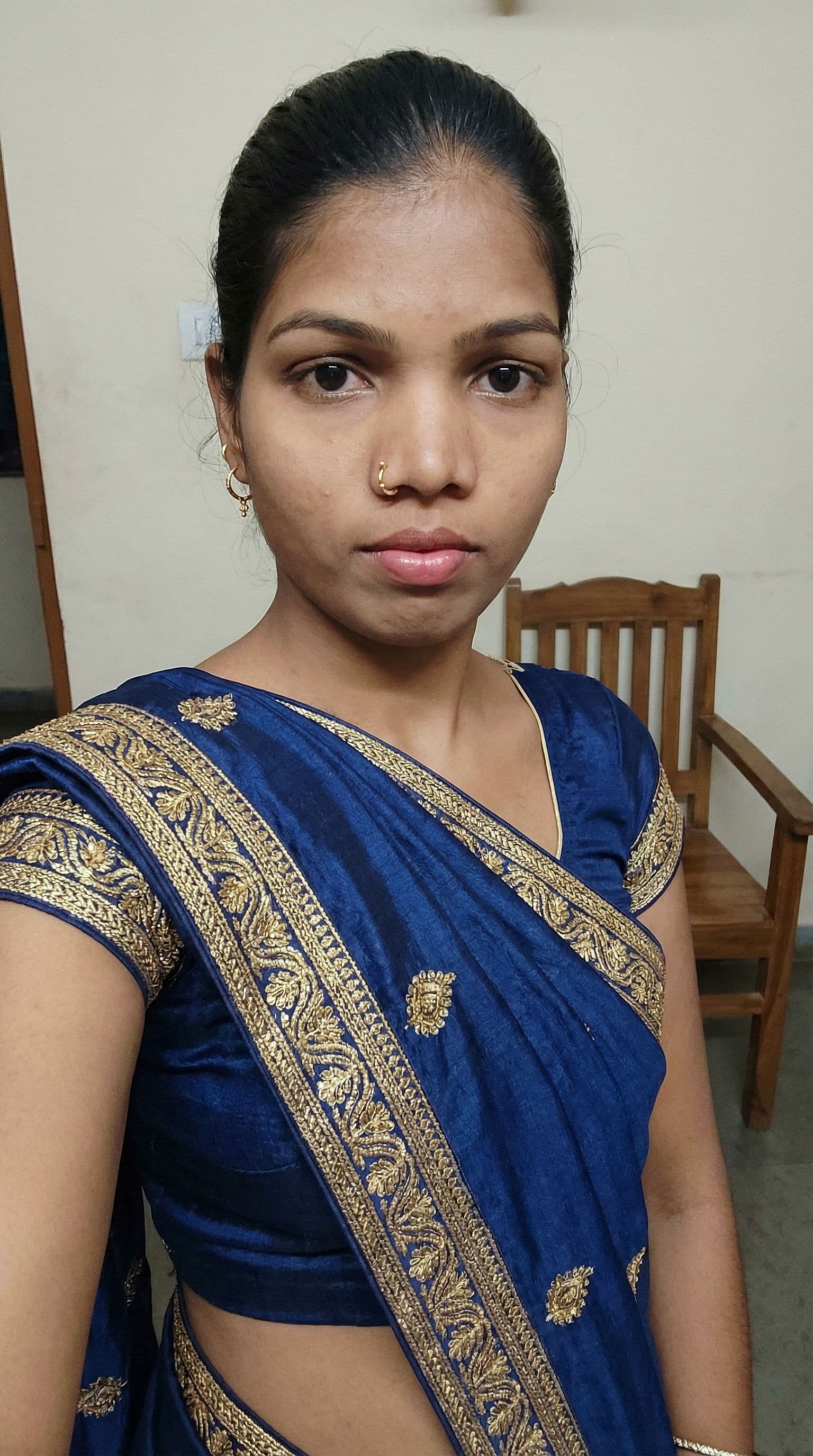 AI generated: Make the girl to strip her body in indian saree. With 100% face accuracy without changing her face. 