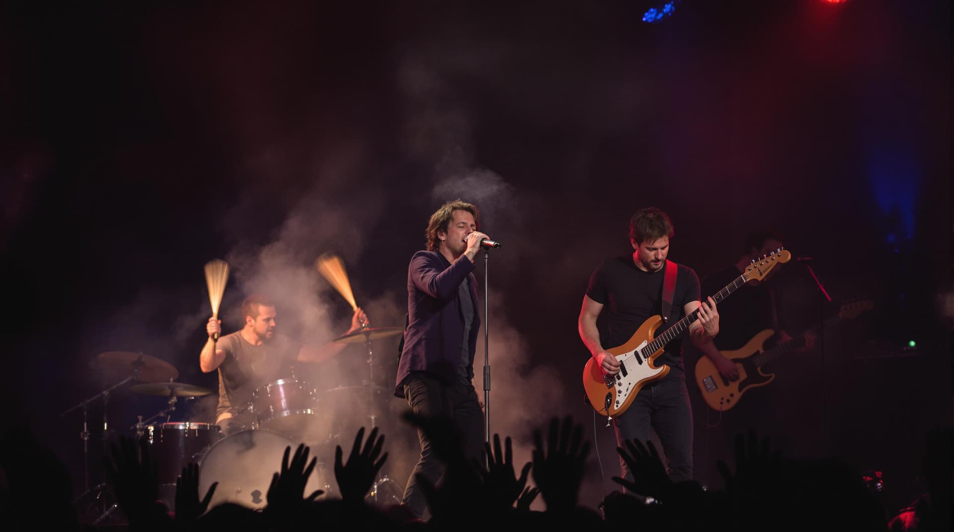 AI generated: A group of four musicians performing on a dimly lit stage with a spotlight illuminating the lead sin...