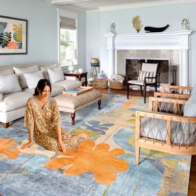 AI generated video: A modern and elegant entryway with ambient lighting and sophisticated decor. A woman wearing a beige...
