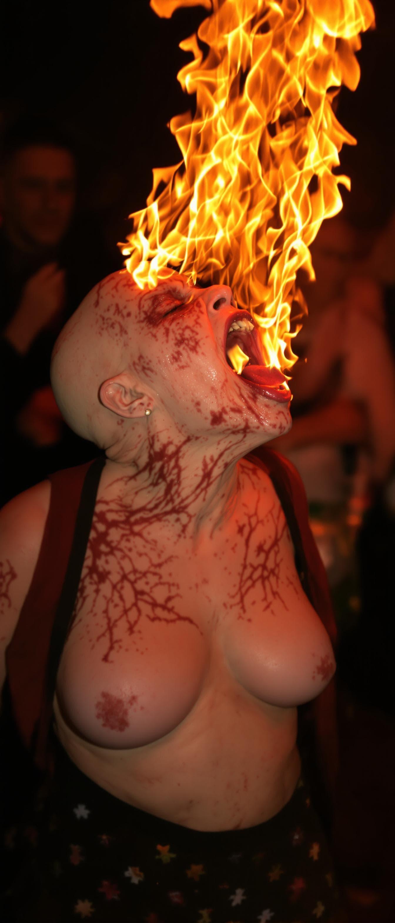 AI generated: An ugly face woman with ugly body  dancing in a party with fire from her mouth  . She is bald . She ...
