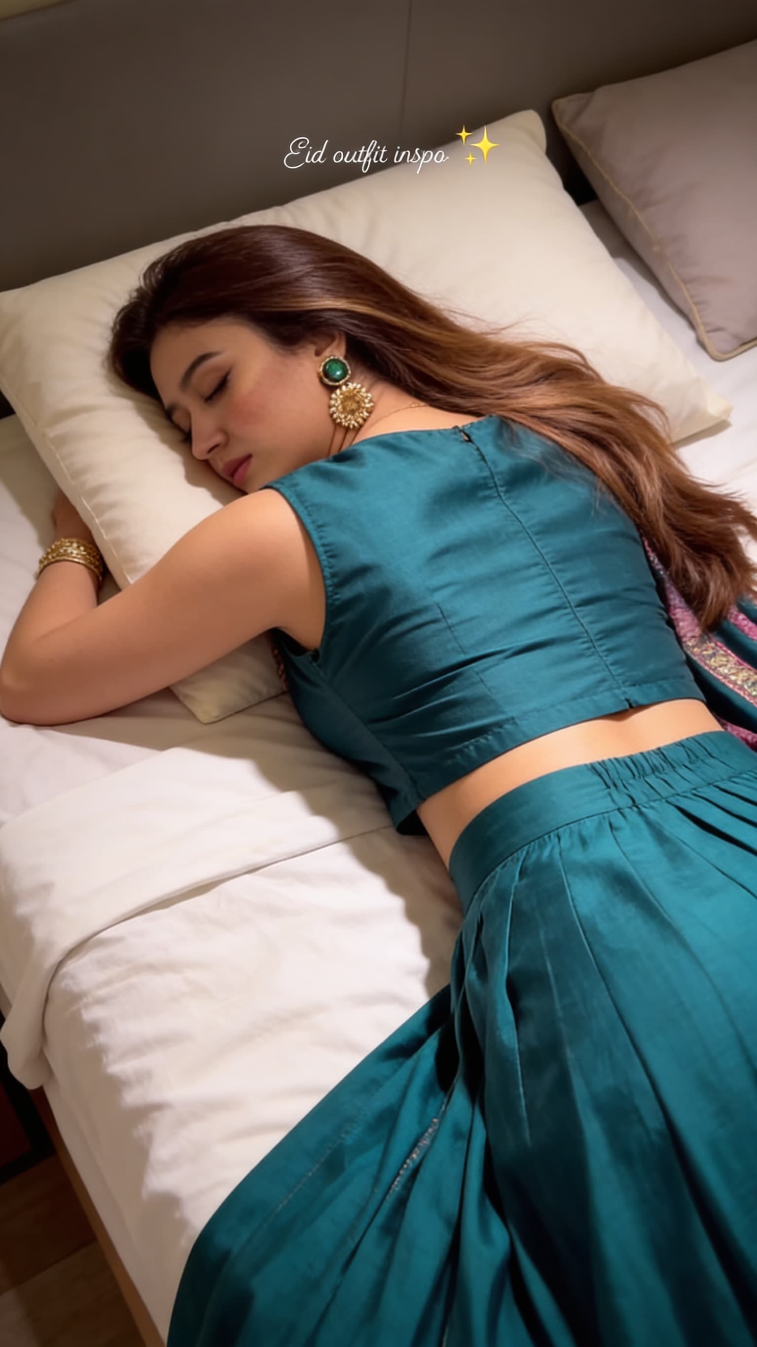 AI generated: Create the ultra high realistic image as this Pakistani women is sleeping lying face down on bed wit...