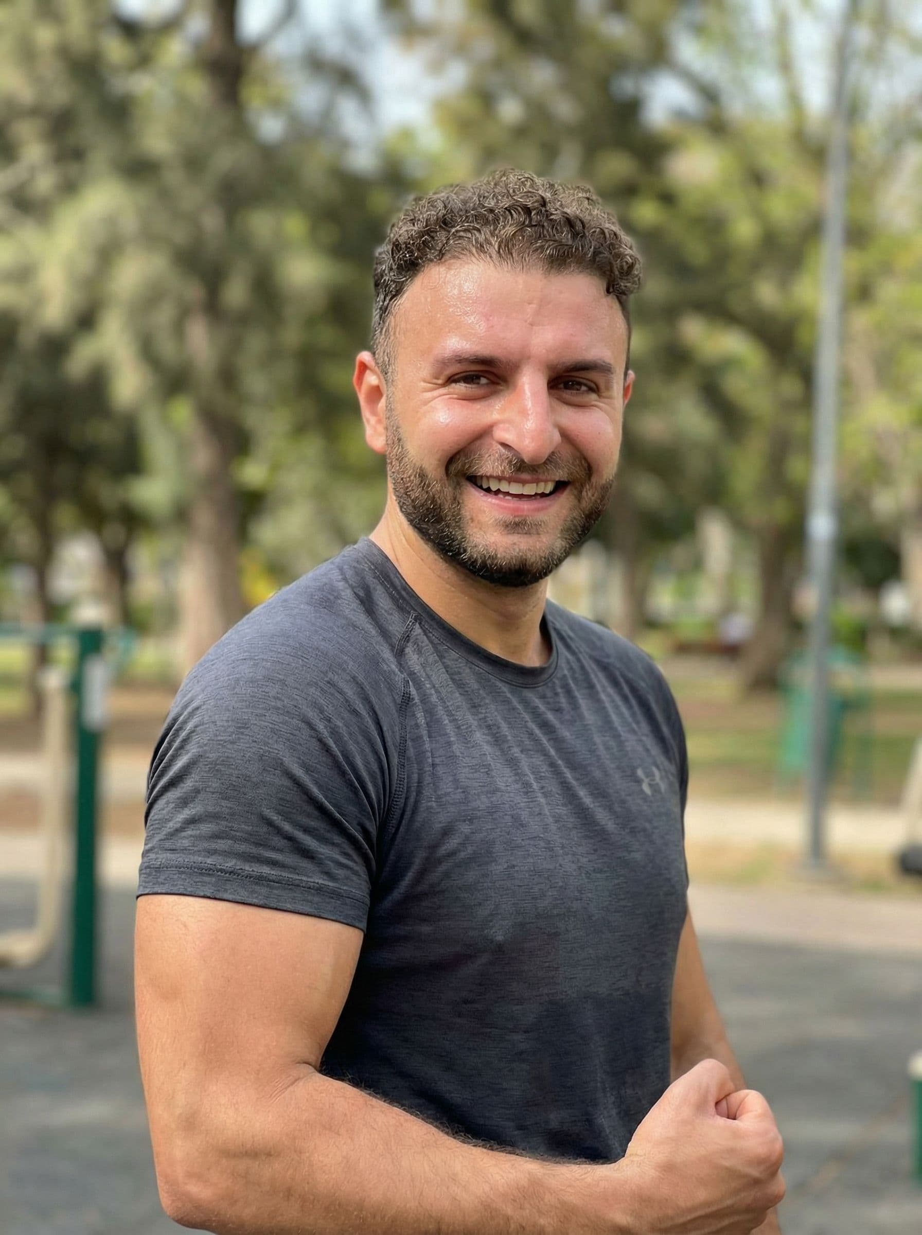 AI generated: a fit man smiling