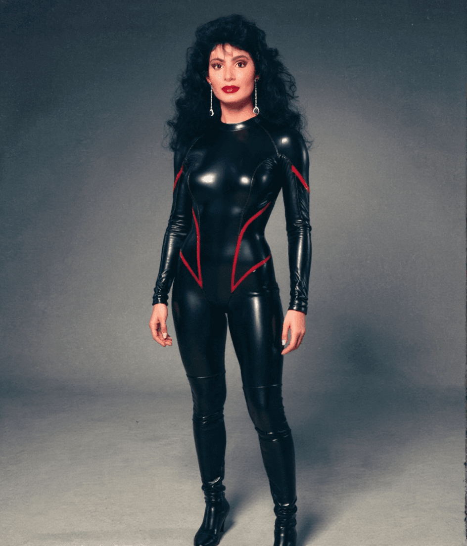 AI generated: full body image, bird's eye view, dramatic lighting, wearing a shiny, skin tight, black  leather bod...
