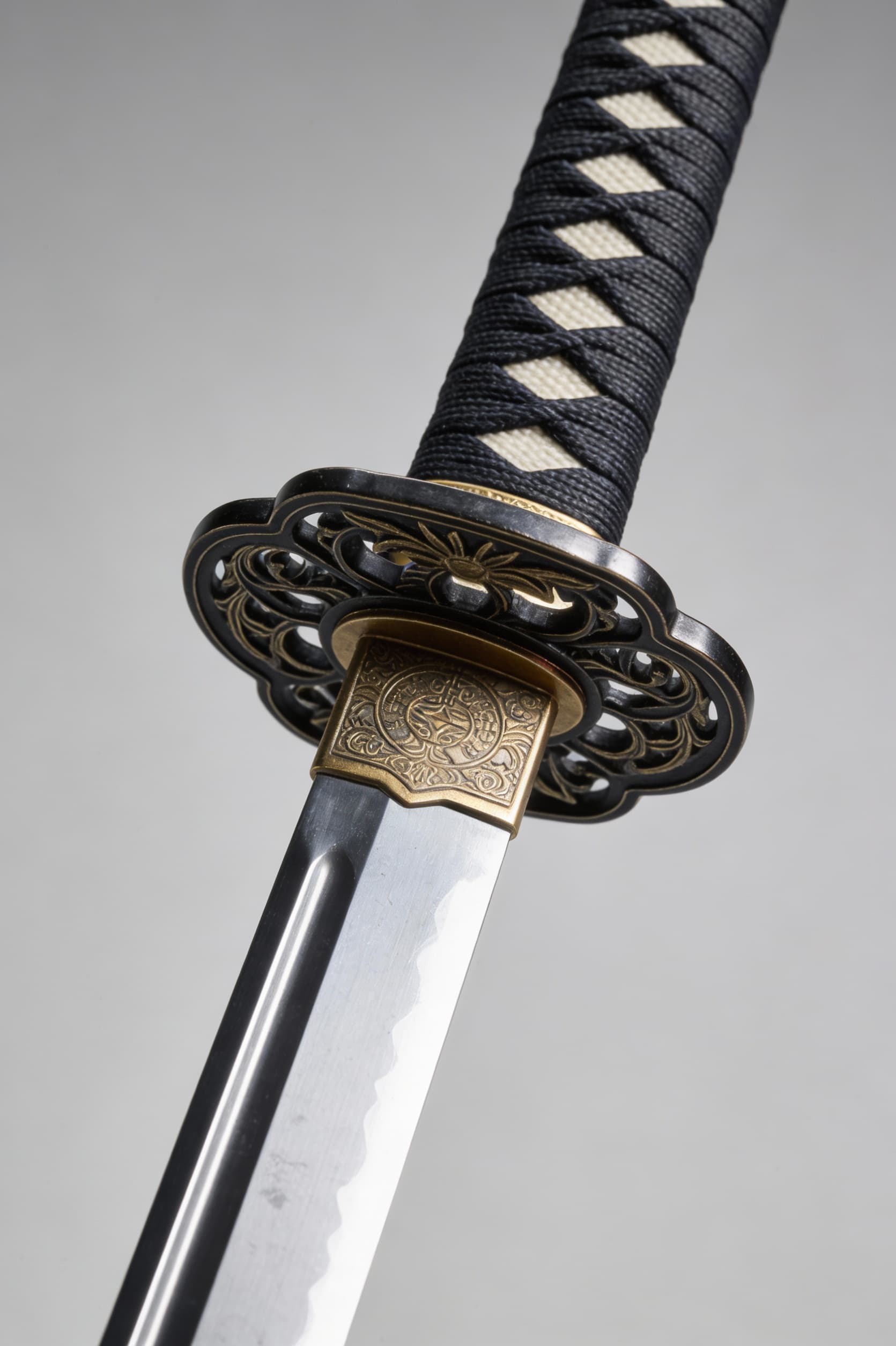 AI generated: Focus on the swords and give a display to showcase only the sword from tip to hilt from the referenc...