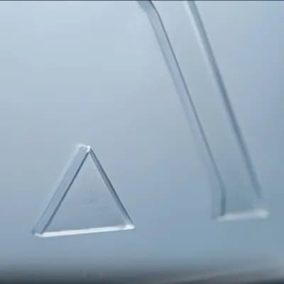 AI generated video: Make the glassy logo render disappear slowly, fading out until it fully disappears, leaving only the...