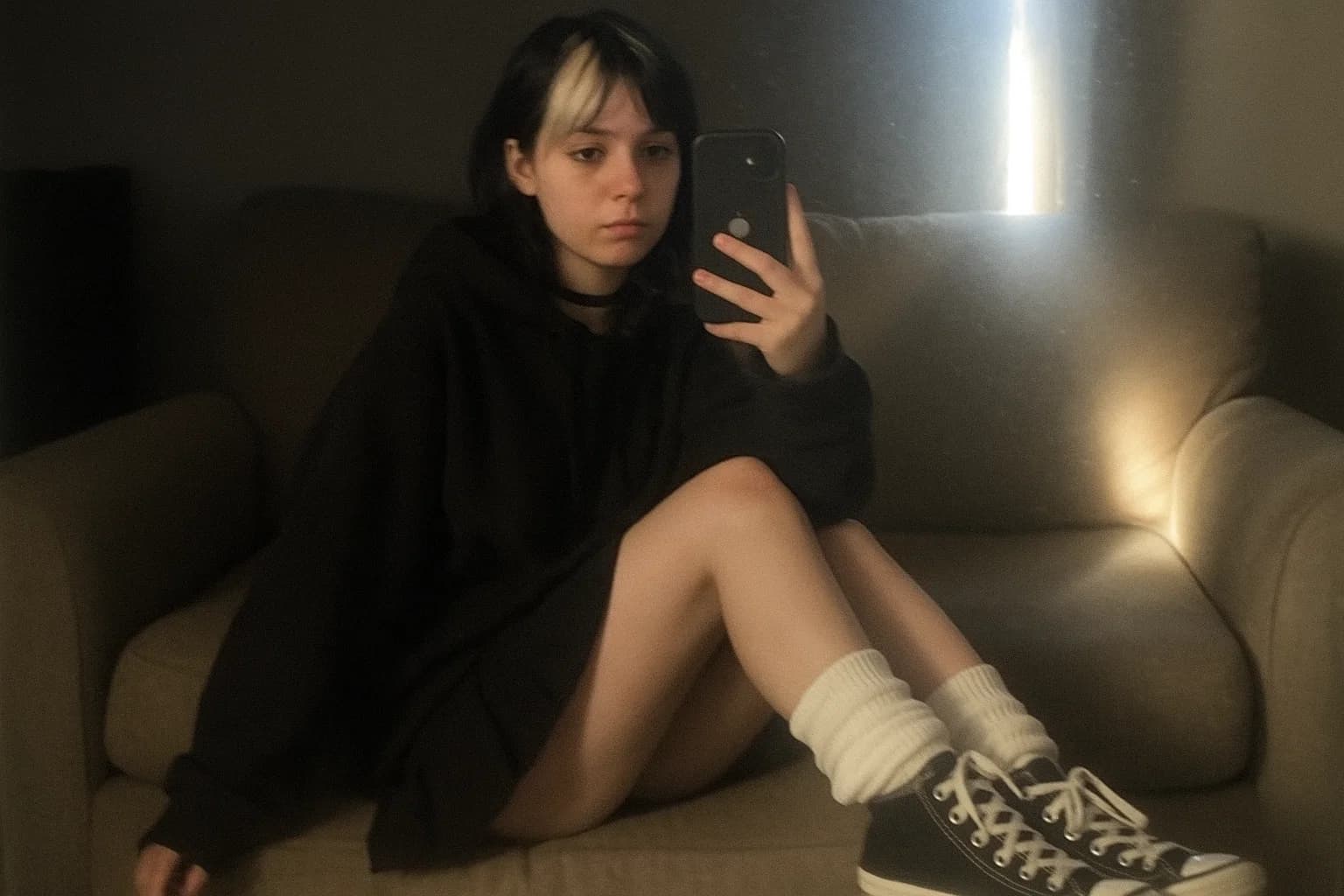 AI generated: An extremely unremarkable iPhone mirror selfie photo with no clear subject or framing—just a careles...